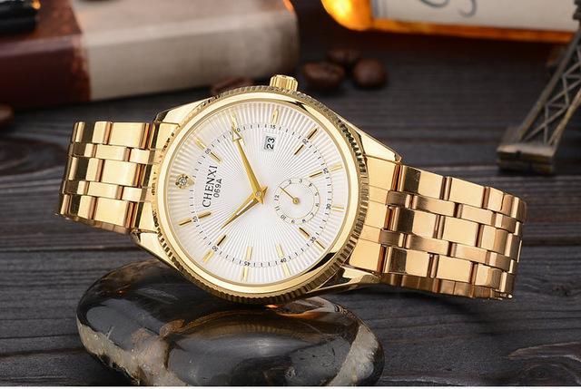gold luxery watch Elevate your style with this luxury gold watch, a timeless blend of sophistication and precision. Crafted with a polished stainless-steel case plated in radiant gold.